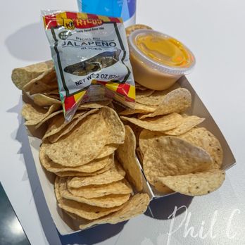 Regal Irvine Spectrum - Tostitos Nachos with cheese and jalapeños. - Cinema Near Me - Irvine, California Regal Irvine Spectrum - Tostitos Nachos with cheese and jalapeños. - Cinema Near Me - Irvine, California