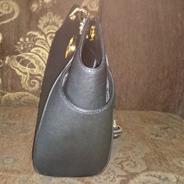 Here is my "scratched" bag that the manager, Colt McCoy, refused to exchange. Here is my "scratched" bag that the manager, Colt McCoy, refused to exchange.