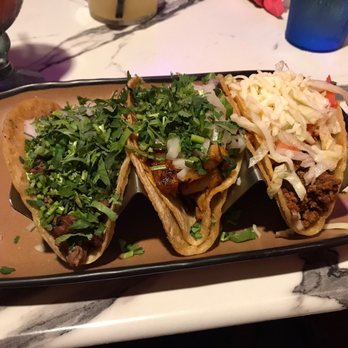 Riviera Maya Taco & Tequila Bar - Asada taco, Al pastor taco, and a Carne de res taco - Cocktail Bars Near Me - Highland, Indiana Riviera Maya Taco & Tequila Bar - Asada taco, Al pastor taco, and a Carne de res taco - Cocktail Bars Near Me - Highland, Indiana