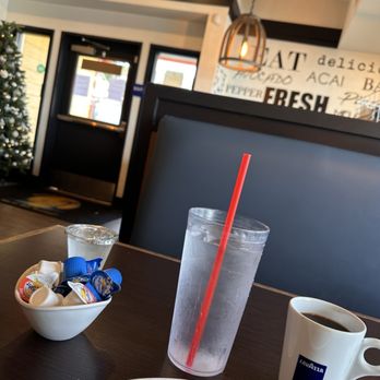 Broken Yolk Cafe - Random pic of the booth, with a view of the Christmas tree! - Breakfast & Brunch Near Me - Orange, California Broken Yolk Cafe - Random pic of the booth, with a view of the Christmas tree! - Breakfast & Brunch Near Me - Orange, California