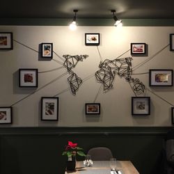 Manna 68 - Cool art on the wall- they're inspired by vegetarian food they've eaten around the world!