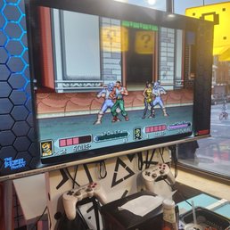 TV set up with a ton of games TV set up with a ton of games