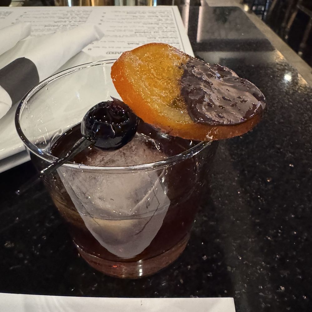 Mochuelo - Closeup - loved the candied orange dipped in chocolate. Rounded out the drink as the evening went along. - Tapas/Small Plates Near Me - Fresno, California Mochuelo - Closeup - loved the candied orange dipped in chocolate. Rounded out the drink as the evening went along. - Tapas/Small Plates Near Me - Fresno, California