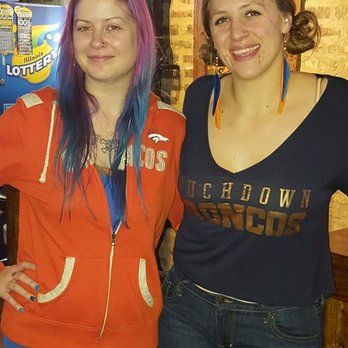 The Unforgettable Bar - two women posing for a picture - Sports Bars Near Me - Chicago, Illinois