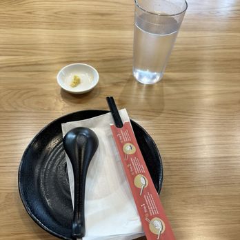 Dough Zone Dumpling House - tiny plate, soup spoon, chopsticks, a little bit of ginger - Dim Sum Near Me - San Jose, California