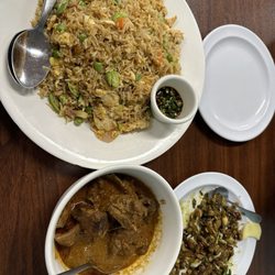 Imbi Restaurant - Imbi Special Fried Rice - top left , the Goat Curry - bottom left and the Laphet Toh (Tea Leaf salad) - bottom right