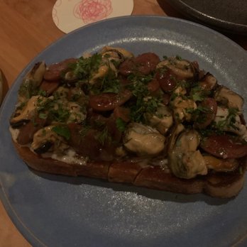 Squable - marinated mussels on grilled bread - Modern European Near Me - Houston, Texas
