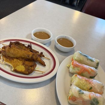 Thai Chef 9 - Spring rolls and chicken satay - Thai Near Me - Rock Springs, Wyoming Thai Chef 9 - Spring rolls and chicken satay - Thai Near Me - Rock Springs, Wyoming