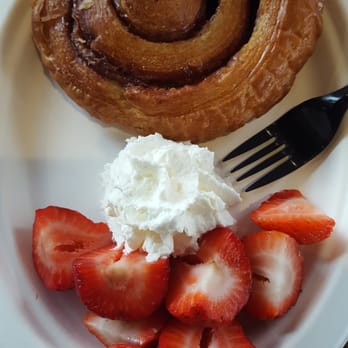 Rekindle Coffee - Cinnamon roll with complimentary strawberrys - Cafes Near Me - Orange, California Rekindle Coffee - Cinnamon roll with complimentary strawberrys - Cafes Near Me - Orange, California