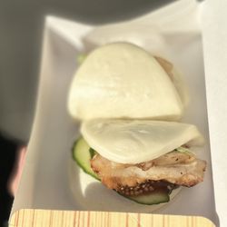 Underbelly - Pork Belly Bao: Chashu Pork Belly, cucumbers, hoisin, pickled mustard seeds, scallions, and cilantro served on steamed buns. | $9