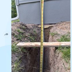 Up North Cleaning And Home Maintenance - 20 inch deep trench.