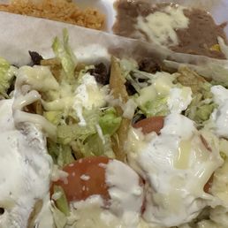 Americanized tacos lol with beans and rice Americanized tacos lol with beans and rice