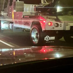 Cedar Towing - Guy is driving a massive two truck weaving in and out of traffic.
