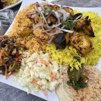 Habibi - Chicken kebab meal with half regular and half spicy rice, hummus, coleslaw and olive salad. - Middle Eastern Near Me - Elk Grove Village, Illinois