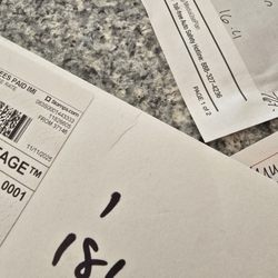 United States Postal Service - Bent envelope with school photos. Strangely enough the envelope says dont bend