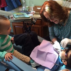 Aspen Dental Center - Kiddo getting his teeth cleaned as sister looks on