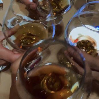 Pasquale's Trattoria - a group of people holding glasses of wine - Italian Near Me - Oakville, Ontario Pasquale's Trattoria - a group of people holding glasses of wine - Italian Near Me - Oakville, Ontario