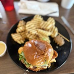 Foot of the Mountain Cafe - Mac n cheese burger.  soooooo goood with it to try it. And if you thinking about saying ewww. Don't knock it until you try it.