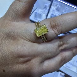 Marquise Jewelers - 3 Carat Yellow Diamond Ring and Matching wedding band.