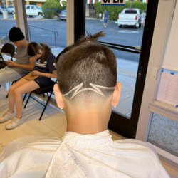 The Modern Gentlemen’s Barbershop - Haircut and design