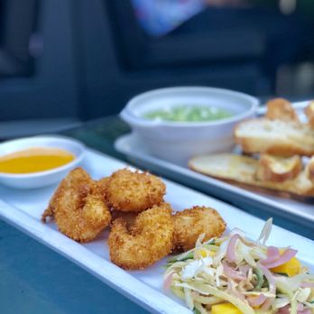 Earls Kitchen + Bar - Hawaiian Coconut Prawns ($10) for happy hour - Canadian (New) Near Me - Richmond, British Columbia Earls Kitchen + Bar - Hawaiian Coconut Prawns ($10) for happy hour - Canadian (New) Near Me - Richmond, British Columbia