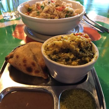 Annapurna's World Vegetarian Cafe - Veggie fried rice in the background. Samosas and kitchari in the front! - Vegetarian Near Me - Albuquerque, New Mexico Annapurna's World Vegetarian Cafe - Veggie fried rice in the background. Samosas and kitchari in the front! - Vegetarian Near Me - Albuquerque, New Mexico