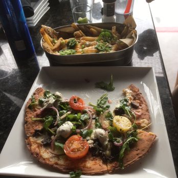 Topgolf - Cheese fries, farmer flatbread, and beer - New American Near Me - Orlando, Florida Topgolf - Cheese fries, farmer flatbread, and beer - New American Near Me - Orlando, Florida