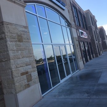 The Baked Bear - Front with clean sidewalks - Desserts Near Me - Yukon, Oklahoma