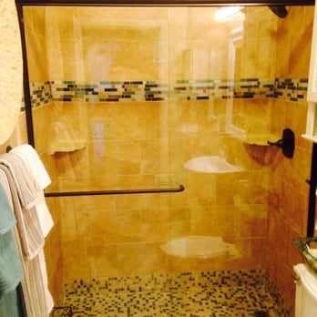 Jerry Saunders Construction - a shower with a glass door - General Contractors Near Me - Modesto, California Jerry Saunders Construction - a shower with a glass door - General Contractors Near Me - Modesto, California