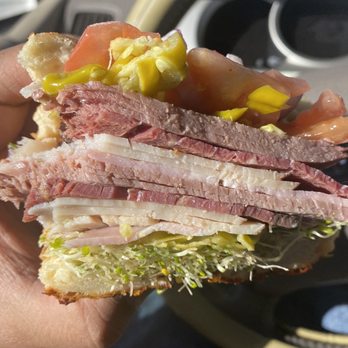 Bubba's Bagels - Big Sur cut in half with one bite taken from the side. I will make it a point to stop there every time for this! - Bagels Near Me - Grass Valley, California