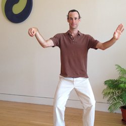 Toward Harmony Tai Chi & Qigong - Dan holding a tai chi posture