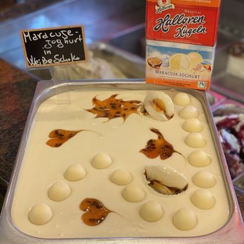 Eiscafe Veneto - Maracuja-Joghurt in Weisse Schokolade - Ice Cream & Frozen Yogurt Near Me - Mainburg, BY Eiscafe Veneto - Maracuja-Joghurt in Weisse Schokolade - Ice Cream & Frozen Yogurt Near Me - Mainburg, BY