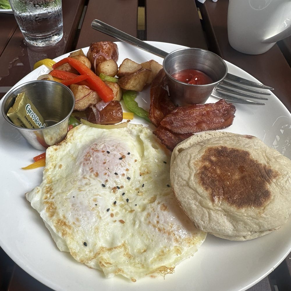 Serafina - 3 eggs over easy, breakfast potatoes, bacon, and an English muffin - Italian Near Me - San Juan, Puerto Rico Serafina - 3 eggs over easy, breakfast potatoes, bacon, and an English muffin - Italian Near Me - San Juan, Puerto Rico