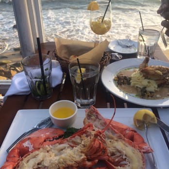 Moonshadows - 1 1/2 lb lobster my friends chicken in the background - Seafood Near Me - Malibu, California Moonshadows - 1 1/2 lb lobster my friends chicken in the background - Seafood Near Me - Malibu, California