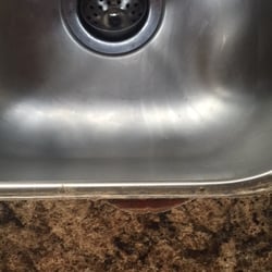 Fun Motors - Just one of the damaged areas on the counter top.  Sales person described this RV as 8.5 out of 10.  Really??????