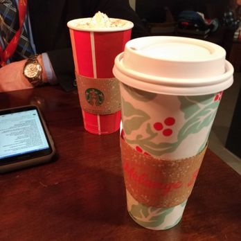Starbucks - a cup of coffee and a cell phone on a table - Coffee & Tea Near Me - Rosemère, Quebec Starbucks - a cup of coffee and a cell phone on a table - Coffee & Tea Near Me - Rosemère, Quebec