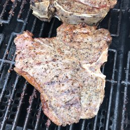 two steaks on a grill two steaks on a grill