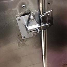 Broken locks on bathroom doors.