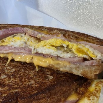 Gus' Deli - Ham, egg, and cheese breakfast sandwich on wheat. - American Near Me - West Allis, Wisconsin