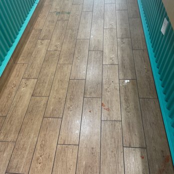 Bahama Buck's - Mansfield - a long hallway with wooden flooring - Shaved Ice Near Me - Mansfield, Texas
