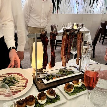 Ambrosia - Deviled eggs, bacon rack, carpaccio and crudo - Steakhouses Near Me - Watersound, Florida Ambrosia - Deviled eggs, bacon rack, carpaccio and crudo - Steakhouses Near Me - Watersound, Florida