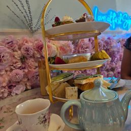 Oolong and peach teas, along with tea cakes, scones, and sweet treats. Oolong and peach teas, along with tea cakes, scones, and sweet treats.