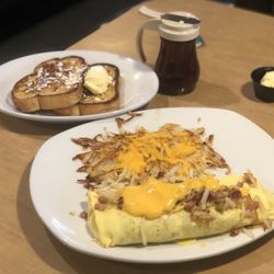 Perkins American Food - Omelet (build your own with sausage, ham, American cheese), House brown with cheese, sub toast for French toast.