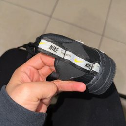 Look at the letters they're PEELING OFF & again the excess glue in the sole Look at the letters they're PEELING OFF & again the excess glue in the sole