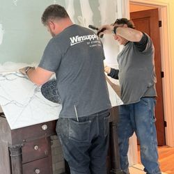 Schede Plumbing & Heating - Dave & Dave tightening hard to reach screws under my new vanity...