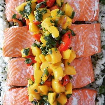 Nourished Source - Salmon over cauliflower coconut-cilantro rice topped with mango salsa - Personal Chefs Near Me Nourished Source - Salmon over cauliflower coconut-cilantro rice topped with mango salsa - Personal Chefs Near Me