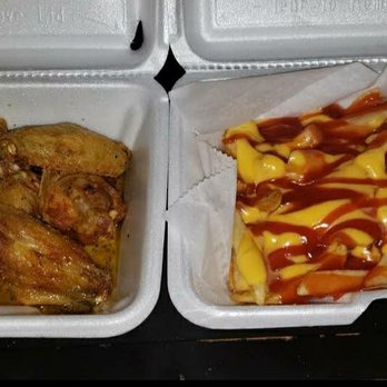 Wings To Go - two take out containers of food - Chicken Wings Near Me - Willow Grove, Pennsylvania Wings To Go - two take out containers of food - Chicken Wings Near Me - Willow Grove, Pennsylvania