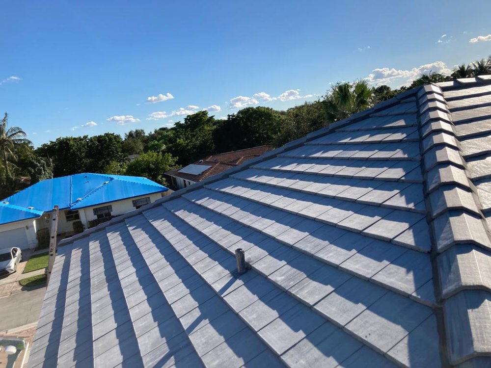 Slide of JMR Roofing Services