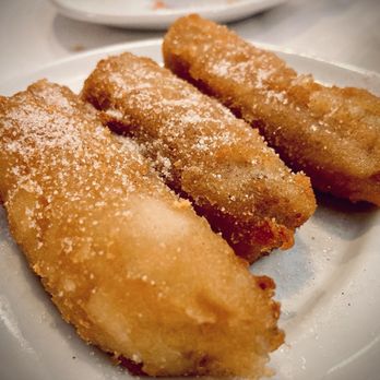 Churrasco Brazilian Steakhouse - Delicious lightly-battered bananas with a dusting of cinnamon and sugar - Brazilian Near Me - Reno, Nevada Churrasco Brazilian Steakhouse - Delicious lightly-battered bananas with a dusting of cinnamon and sugar - Brazilian Near Me - Reno, Nevada