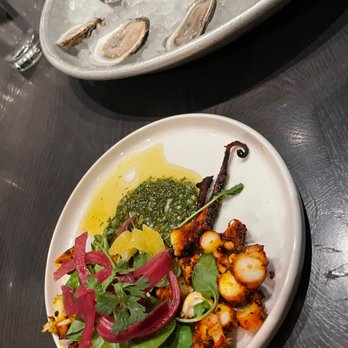 Pearl & Vine - Grilled Squid or Octopus salad and East Coast Oysters on a half shell - New American Near Me - Katy, Texas Pearl & Vine - Grilled Squid or Octopus salad and East Coast Oysters on a half shell - New American Near Me - Katy, Texas